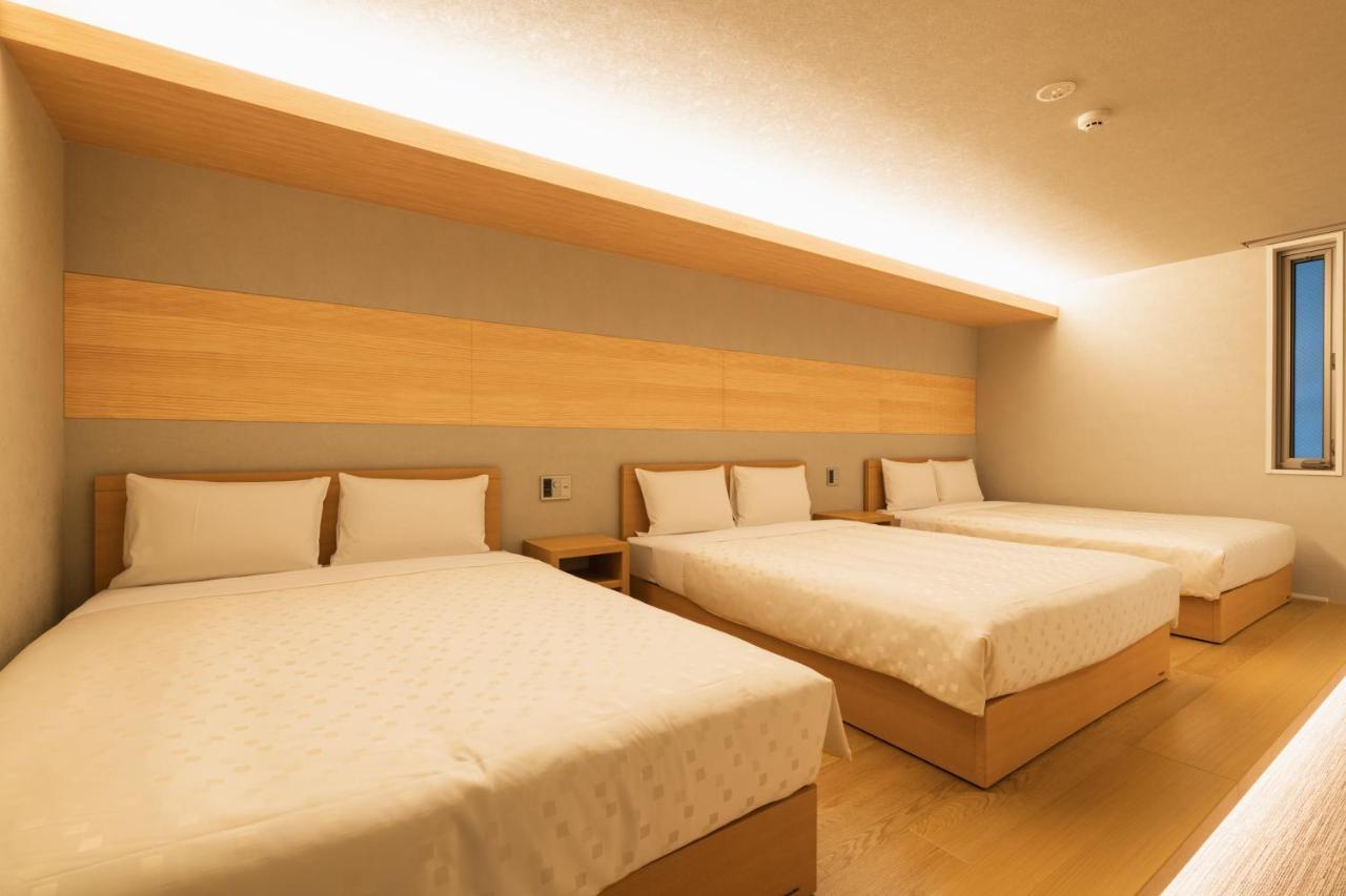 GRAND BASE Hakata Station Aparthotel Fukuoka  Bagian luar foto